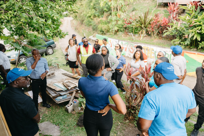 Exchange with participants at the home of a beneficiary of a Rainwater harvesting system in Grenada
