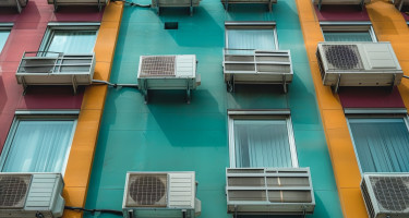 Air conditioners on the facade of a building.