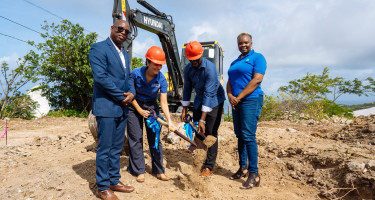 GIZ Head of Project Marion Geiss turns sod with Minister Hon. Tevin Andrews