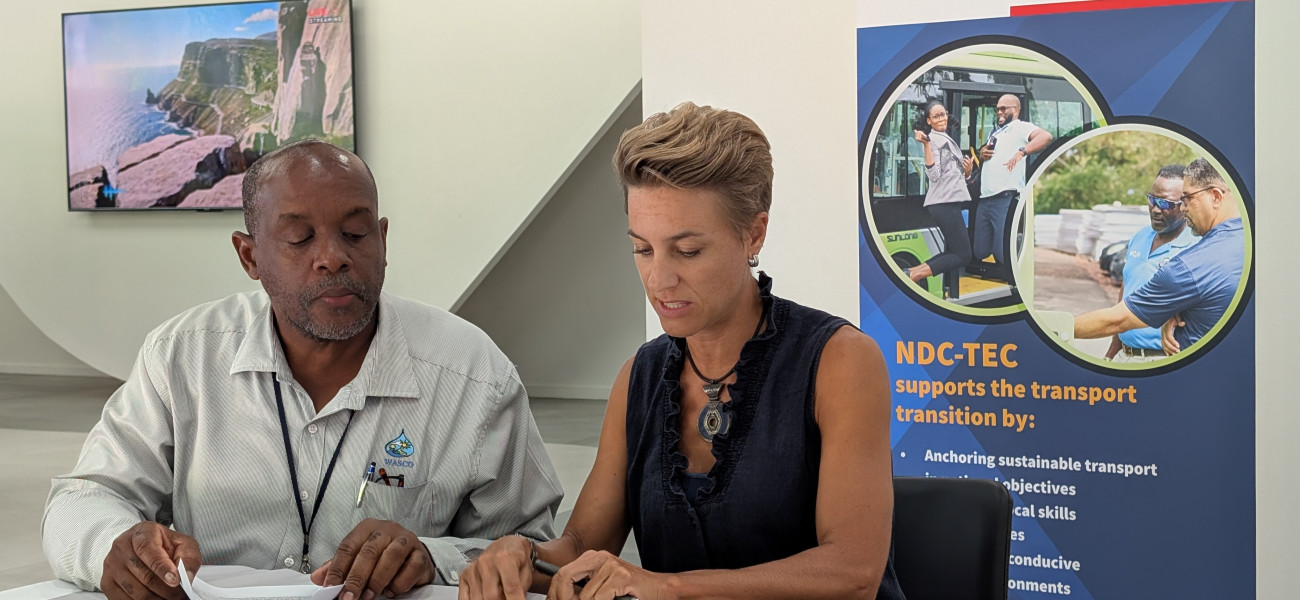NDC-TEC Programme Director, Ms Ina De Visser (right) hands over car entitlement to WASCO’s representative, Technical Services Manager, Mr Tera Victor (left)