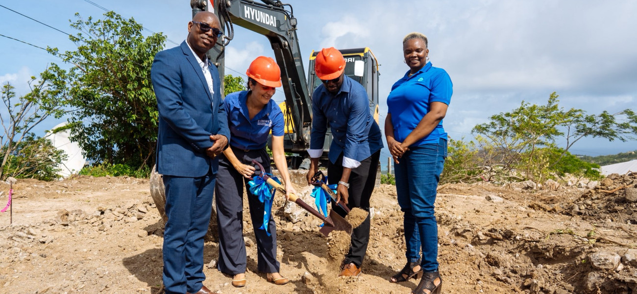 GIZ Head of Project Marion Geiss turns sod with Minister Hon. Tevin Andrews